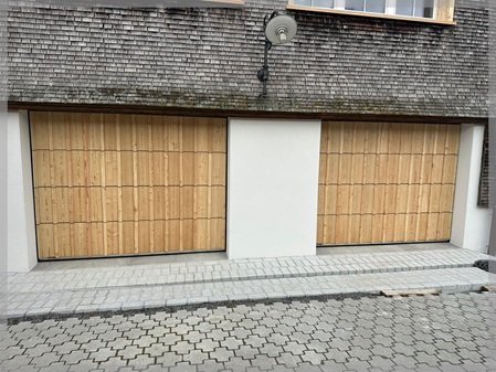 Garagentor mit Holzbeplankung an Appenzeller Bauernhaus