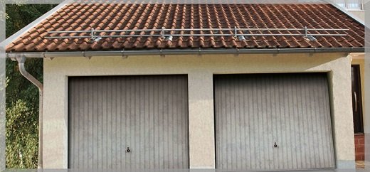 https://www.spezialtorbau.ch/garagentore-Seitenektionaltore-Hebefalttore.html